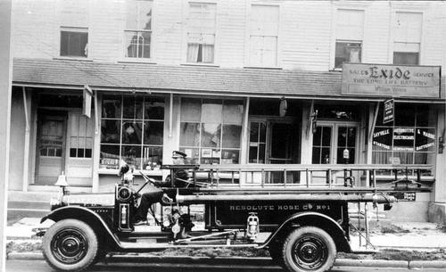 1923 Reo Pumper, 300 GPM, in front of Greens Block, Main St. and Green Ave